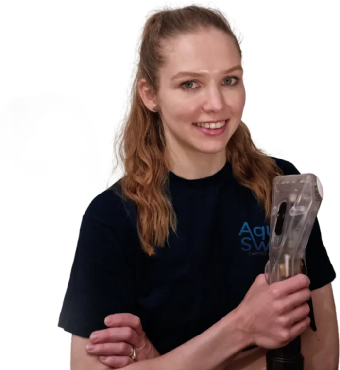 Caroline from AquaSweep holding a cleaning wand